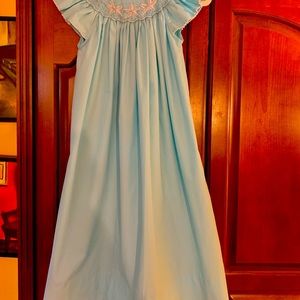 Smock dress size 6x measure 31in. from neckline in excellent condition